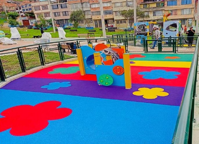 Parque con piso EPDM de flores y franjas de colores